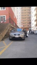 фольксваген поло седан: Kia Cerato: 1.5 l | 2009 il Sedan