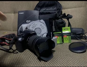 крышка объектива: Зеркальная камера Canon с объективом. В комплекте также идет сумка для