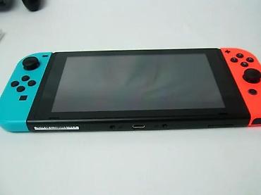 Nintendo Switch: Nintendo Switch V2 konzola u korektnom stanju, sa manjim tragovima — 8