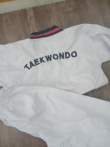 Taekvondo forması – üst və şalvardan ibarət dəst. - Rəng: ağ - Üst