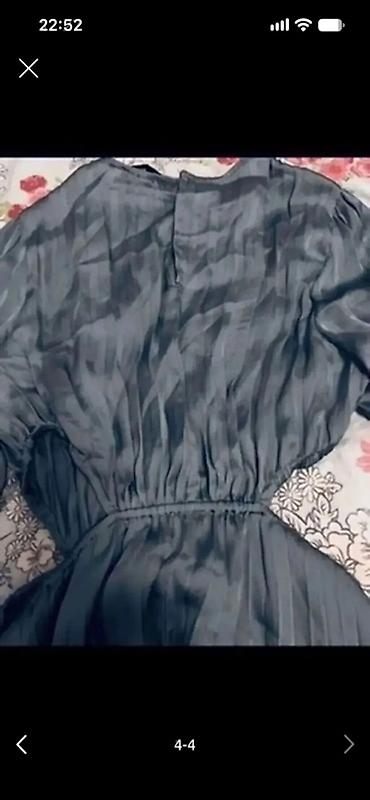 Mango qadın paltarı - Stil: Uzun, axıcı siluetli, bel hissəsi