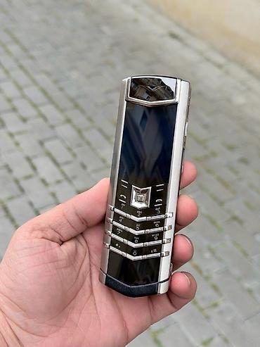 vertu phone: Vertu 4 GB, rəng - Gümüşü, Düyməli — 5