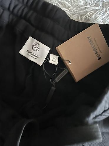 Спортивная одежда: Черные спортивные штаны Burberry. - Модель: джоггеры с манжетами по — 2
