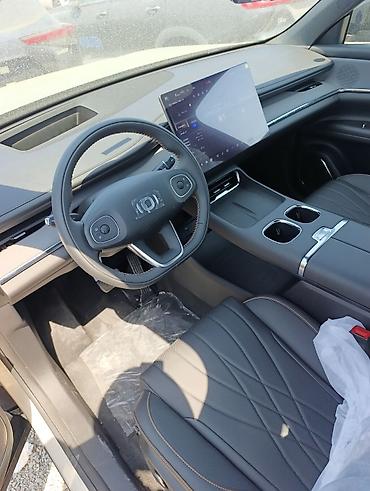 mini ev: Электрокроссовер (серебристый цвет кузова) Описание: - Современный — 6