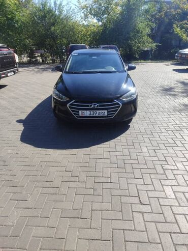 хундай элентра 2003: Hyundai Elantra — это седан черного цвета, предназначенный для