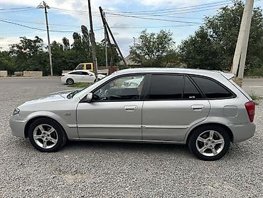 пороги демио: Mazda 323: 2001 г., 1.6 л, Механика, Бензин, Хэтчбэк — 6