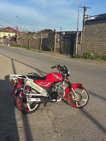 50 kub moped: Moped/Motosiklet – MX49, qırmızı rəng Xüsusiyyətlər: - Model: MX49 — 2
