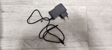 Modemlər və şəbəkə avadanlıqları: Adapter. 12 volt 1000mA . Адаптер 12 вольт