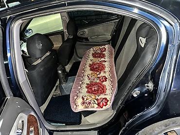 Другие автомобили: Седан бизнес‑класса темно-синего цвета. Просторный салон с мягкой — 1