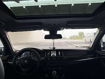 BMW: Böyük manitor Boyük gozik 4 knopkadan ibaratdi Head up (elektron — 8