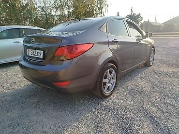 getz 2: Hyundai Solaris: 2011 г., 1.6 л, Автомат, Бензин, Седан — 4