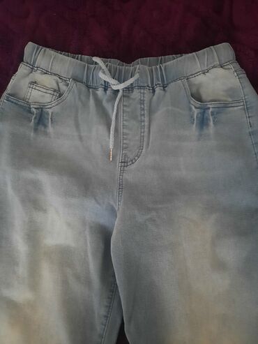 Digər kişi geyimləri: Açıq mavi rəngli cins şalvar - Model: Jogger tərzi cins şalvar -