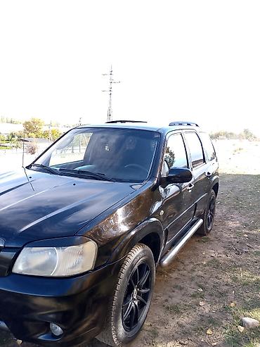 mazda 323 1999: Mazda Tribute: 2004 г., 2.3 л, Механика, Бензин, Кроссовер — 7