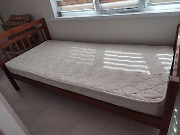 wooden bed: Односпальная кровать из массива дерева с реечным основанием. - — 5