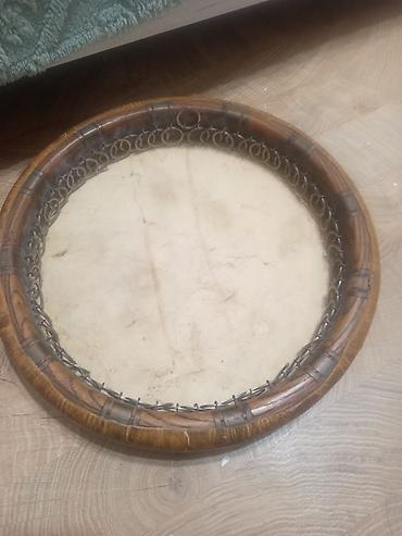 Zərb alətləri: Məhsul: Dəf (çərçivə zərb aləti) Təsvir: - Dairəvi taxta korpuslu — 1