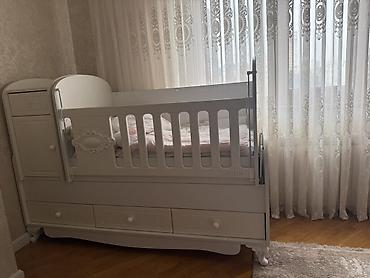 Дом и сад: Ağ rəngdə uşaq otağı dəsti Tərkibi: - Beşik‑komod: sağdan-soldan — 4