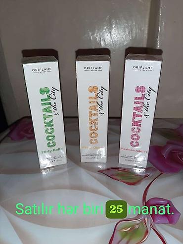 Ətriyyat: Oriflame brendinə aid "Dancing Lady Hypnotic Night" ətri. Bu ətir 50 — 64