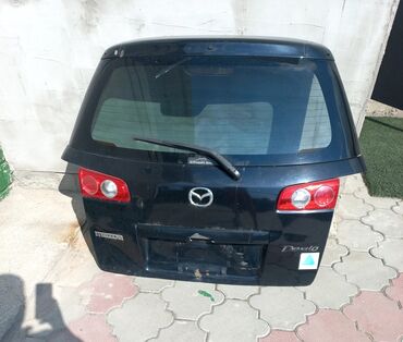 продаю авто в аварийном состоянии: Крышка багажника Mazda 2003 г., Б/у, цвет - Черный,Оригинал