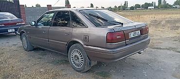 Транспорт: Mazda 626: 1992 г., 2 л, Механика, Бензин, Седан — 4