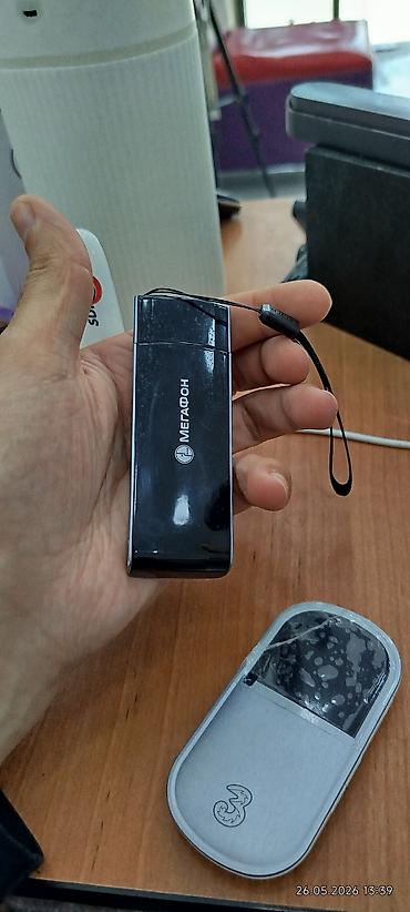 irsad iphone 13 pro: Portativ mobil Wi‑Fi (MiFi) cihazı - Operator loqolu kompakt cib — 4