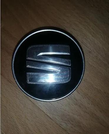 kupujem prodajem svasta: ČEPOVI POKLOPCI ZA FELNE SEAT 56 MM / 52 MM - CRNI ORIGINAL | IMAMO — 2