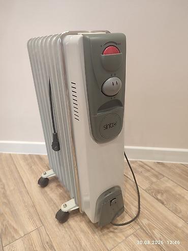Elektronika: Yağ radiatoru – Sinbo markası, 9 bölməli Xüsusiyyətlər: - Mexaniki — 3