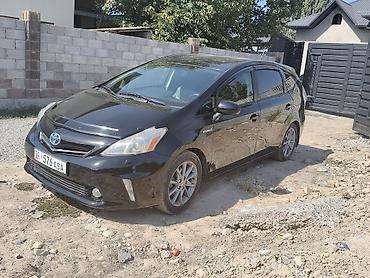 byd e2 2025: Toyota Prius V: 2012 г., 1.8 л, Гибрид, Универсал — 8