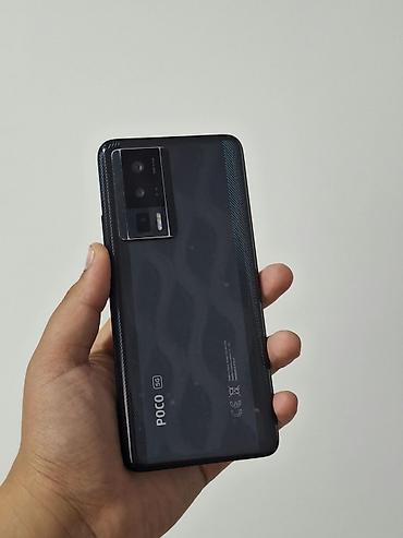 separator nədir: Poco F5 Pro, 256 GB, rəng - Qara, Zəmanət, Barmaq izi, Simsiz şarj — 1