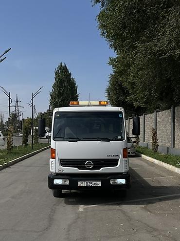 нис: Эвакуатор, Nissan, 2012 г., Сдвижная — 3