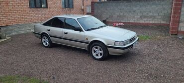 срочно продаю в связи с переездом: Mazda 626: 1988 г., 2 л, Механика, Бензин, Седан