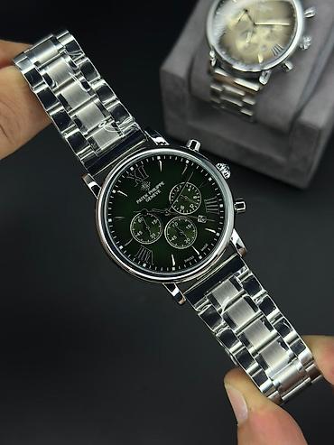 patek: Kvars mexanizmalı kişi qol saatı - Korpus: parlaq polad, yanlarda — 1