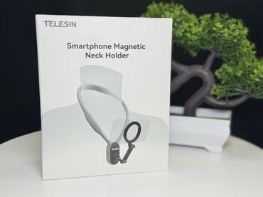 telfo: Telesin markasının smartfon üçün maqnit boyun tutacağı. Bu tutacaq