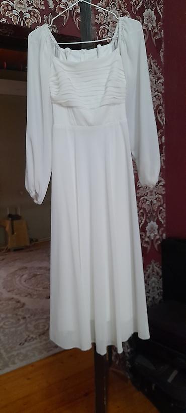 Хиджаб: Mavi rəngli, başlıqlı uzun abaya/çarşaf tipli üst geyimi. - Material — 9