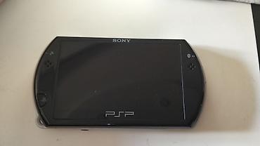 plastation klub: Psp Go ideal vəziyyətdə, original reklamı var,11 oyun var: Agent 007 — 3
