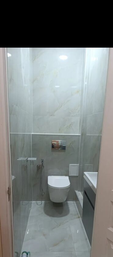 Укладка плитки: Услуги по облицовке ванных комнат и душевых плиткой/керамогранитом под — 22