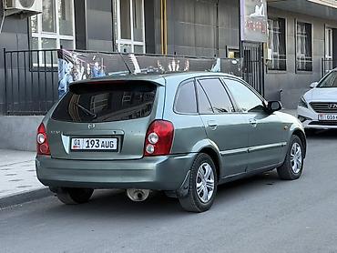 ex 5: Mazda Familia: 2003 г., Автомат, Бензин, Хэтчбэк — 2