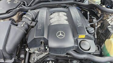 Mercedes-Benz: Mercedes-Benz E 240: 2.6 l | 2000 il Sedan — 3