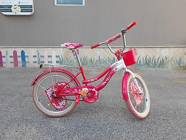 Velosipedlər: Uşaq velosipedi – Barbie temalı, qırmızı/ağ dizayn. Xüsusiyyətlər: - — 5