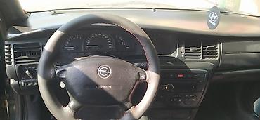 disklər təkərlər type 1: Opel sedan – 5 qapılı, qara rəng. Şəhərdaxili gündəlik istifadə üçün — 7