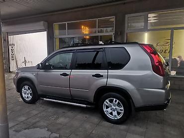 jetta 2008: Nissan X-Trail model avtomobili. Açıq qəhvəyi rəngdə, dam relsləri ilə — 9