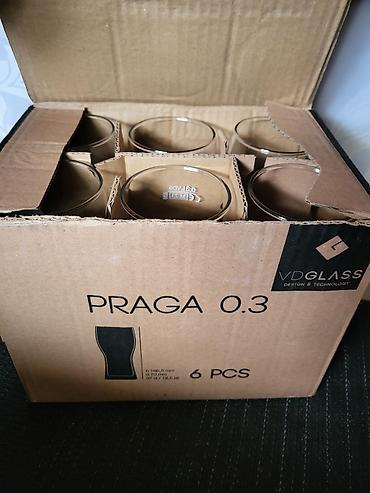 Čaše: Case nove za Lasko pivo. Nove case za pivo sve na njima odsjaj od — 2