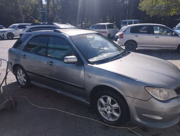 эмблема авто: Subaru Impreza: 2006 г., 1.5 л, Механика, Бензин, Универсал