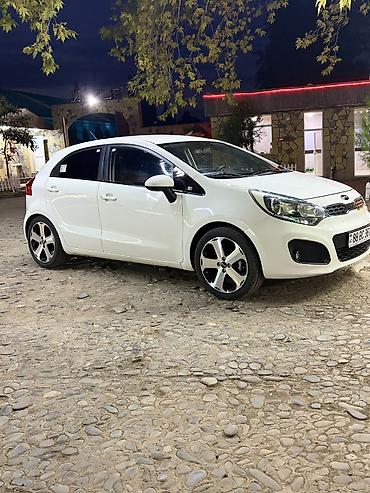 Kia: Kia Rio: 1.4 л | 2012 г. Хэтчбэк — 2