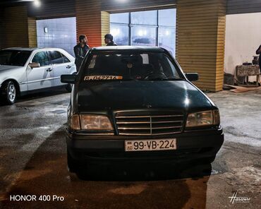 Mercedes-Benz: Mercedes-Benz 220: 2.2 l | 1995 il Sedan — 1