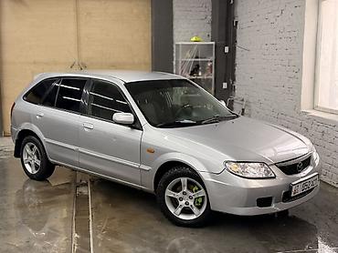 Mazda: Mazda 323: 2003 г., 1.6 л, Механика, Бензин, Универсал — 5