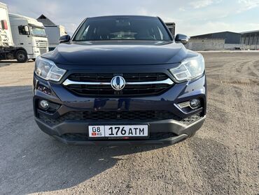 женские машины: Пикап SsangYong Rexton Sports темно-синего цвета с жесткой крышей