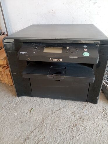 модем скупка: Многофункциональное устройство Canon в черном корпусе. Оснащено
