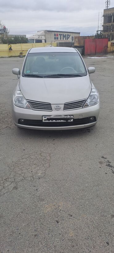 disk r: Nissan Tiida sedan - Kuzov: 4 qapılı sedan, gümüşü rəng - Mühərrik
