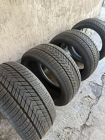 шины радиус 18: Зимние новые шины разноширокие R21 Передняя ось: 275/40 R21 Задняя — 1