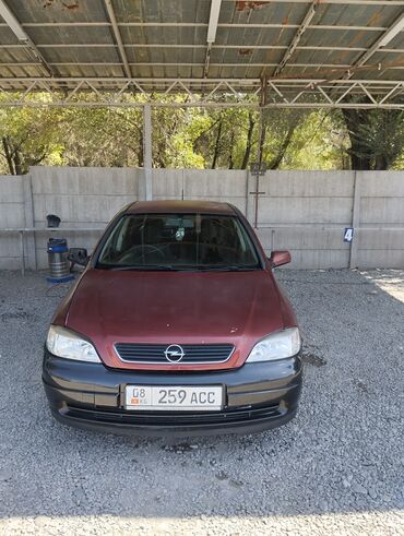 бампер шевроле спарк: Седан Opel Astra с кузовом бордового цвета и черным бампером